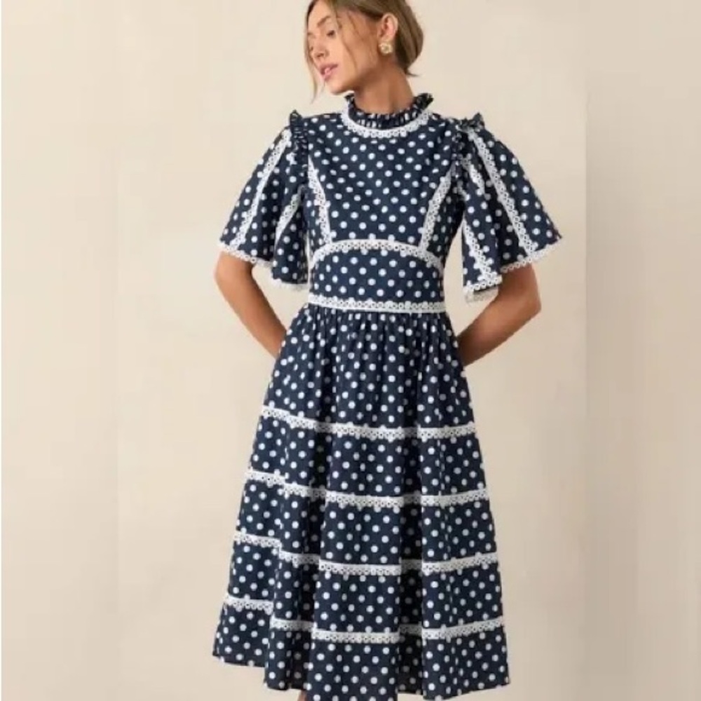 New with tag Prosperina Polka Dot Dress with White Trim.